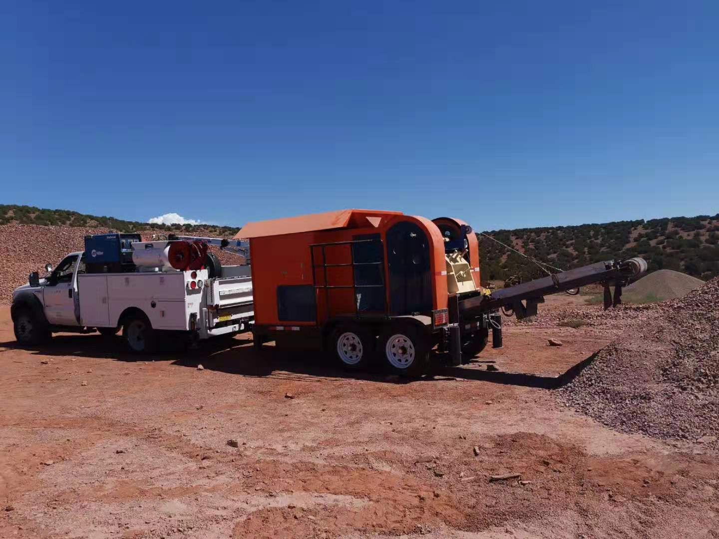 a white truck with the word utility on the back